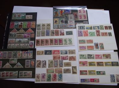 The collection of old stamps from French colonies on stock cards
