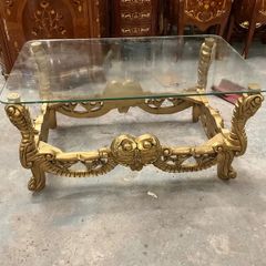 Old glass topped gilt wood table