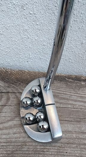 Putting with Balls