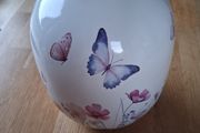 Ceramic vase with butterfly and floral design