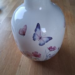 Ceramic vase with butterfly and floral design