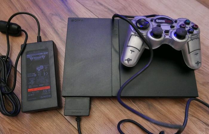 Playstation 2 slim - PS2 slim (works well)