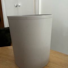 Compact grey trash can