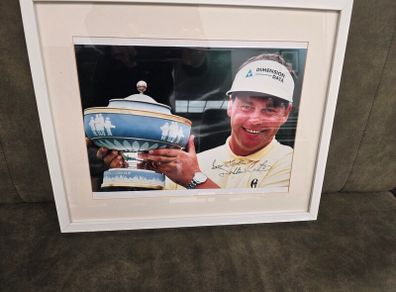 signed and framed photo of Darren Clarke