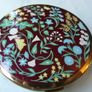 A Collection of Mid-Century Compacts. Tallent Enamel, Kigu, a Courting Couple Novelty Piece and a Henriette Pocket-Watch Compact Image 3