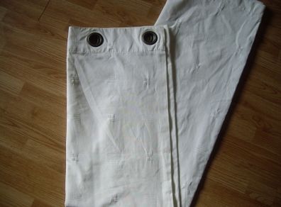 White  curtains with print on.