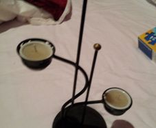 Black wrought iron candle holder
