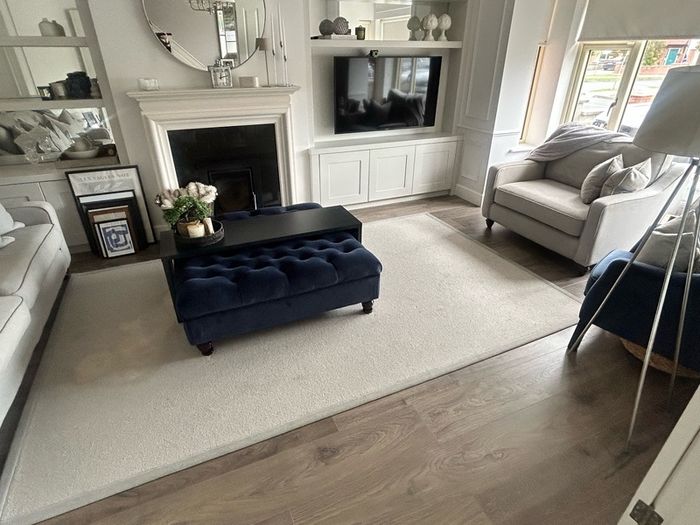 Cream rug with grey border