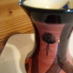Lovely small vase ( Jersey pottery) c.l hand painted.