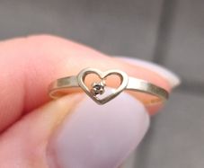Yellow 9ct gold love heart ring with diamond size I