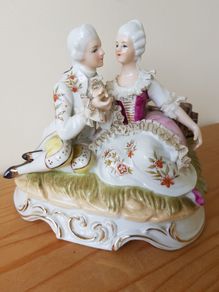 A Statue of Rococo lovers on a bench