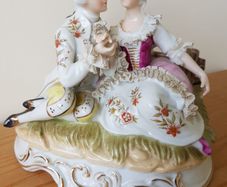 A Statue of Rococo lovers on a bench