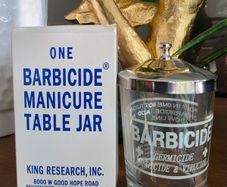 One barbicide manicure table jar