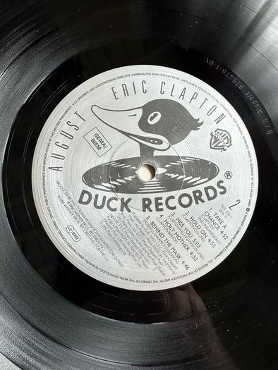 Eric Clapton original 1986 release of August. Vinyl is nm sleeve showing signs of wear