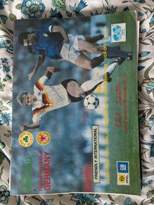 football programme signed by Alec Ferguson