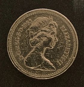 One-pound UK Coin 1983 (rare) Queen Elizabeth II Error Coin-upside-down "DECUS ET TUTAMEN" inscription