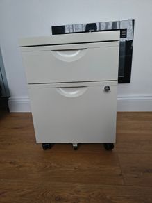 Small filing cabinet on wheels