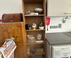 Tall wooden shelving unit