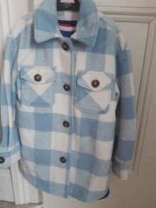 Girls blue and white jacket.