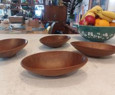 Lovely Set of Four Vintage Mid Century Modern Hand-Carved Wood Nibbles Bowls in Excellent Condition.