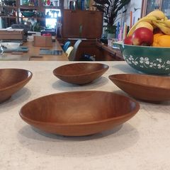 Lovely Set of Four Vintage Mid Century Modern Hand-Carved Wood Nibbles Bowls in Excellent Condition.