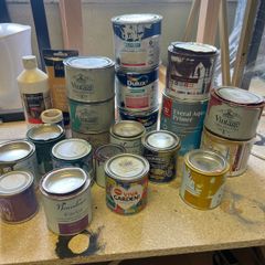 Open tins of paint and new painting products