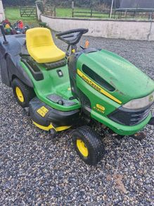 John Deere  X130R ride on mower Delivery available