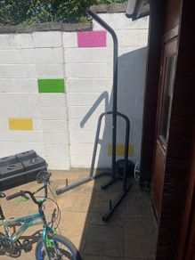 punch bag, stand and weight plates