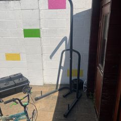 punch bag, stand and weight plates