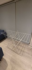 White metal clothes airer - folding laundry drying rack