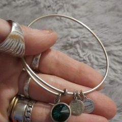 silver Alex and ani bracelet with emerald stone