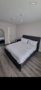 Kingsize vegan leather bed & bedside lockers