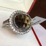 A beautiful silver ring with smokey quartz and white topaz. Image 3
