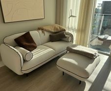 Brand new white couch and pouffe