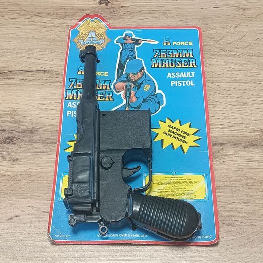 Vintage 1970s/1980s plastic clicker/sound toy guns sealed on their original card