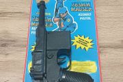 Vintage 1970s/1980s plastic clicker/sound toy guns sealed on their original card