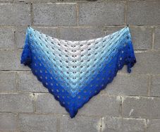 Handmade crochet triangle shawl wrap. Blue and white ombre lacy shawl