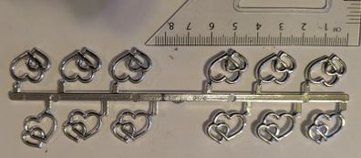 Silver heart embellishments - craft supplies
