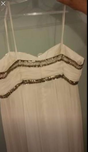 Brand new with tag designer handmade wedding dress by Dresscode. Grecian style with embellishments