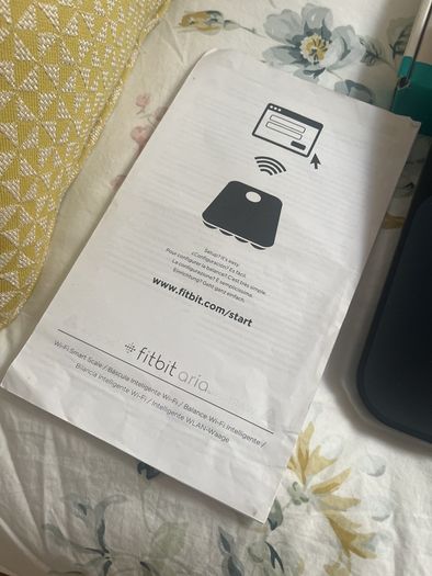 weighing scales FitBit and FitTrack