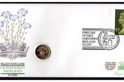 1986 Northern Ireland Royal Mint First Day of Issue of UK1 Coin with Uncirculated UK1 coin cancel tied UK1 definitive Stamp PNC (philatelic Numismatic Cover).