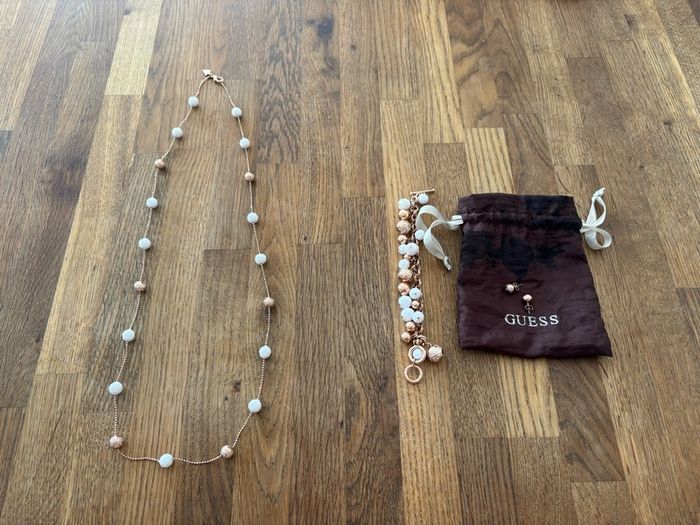 Guess 3 piece rose gold and white jewellery set.l