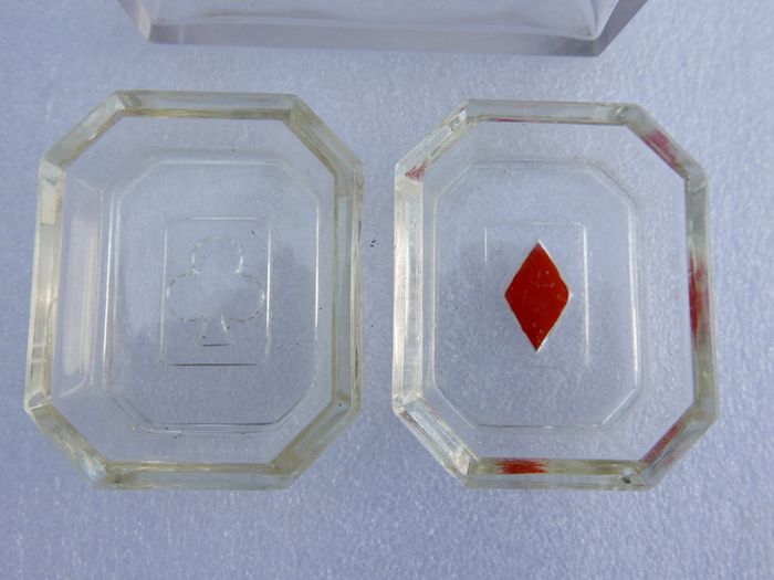 vintage set of molded glass card suit dishes and a matching container, commonly used as bridge ashtrays or nut/trinket dishes.