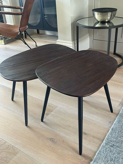 2 coffee tables in dark wood/ black legs. Unused. From Arnotts. Kidney shaped.
