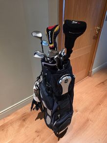 Taylor Made golf clubs with cart bag and travel cover