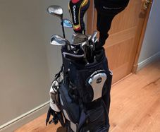 Taylor Made golf clubs with cart bag and travel cover