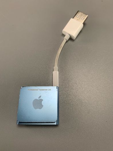 Apple iPod Shuffle 4th Generation, a small, portable MP3 player