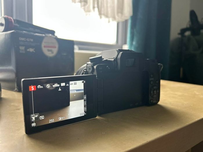 Panasonic Lumix G7 (Open Box) + 12-60 lens + Camera Bag + Stand and more