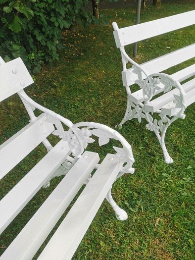 2 garden benches with heavy victorian cast iron ends