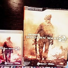 Call Of Duty Modern Warfare 2 PlayStation 3 Game And Book.